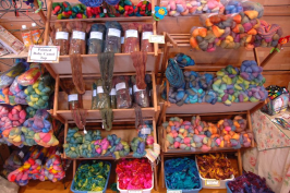 Boxes of space dyed roving ready to spin